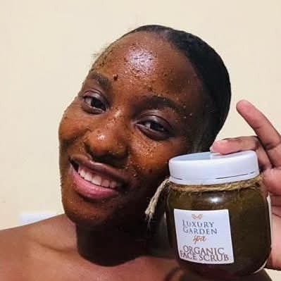 Guest holding a jar of Organic Face Scrub